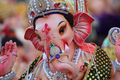 Free Close-up of beautifully adorned Lord Ganesha idol during a Hindu festival celebration. Stock Photo
