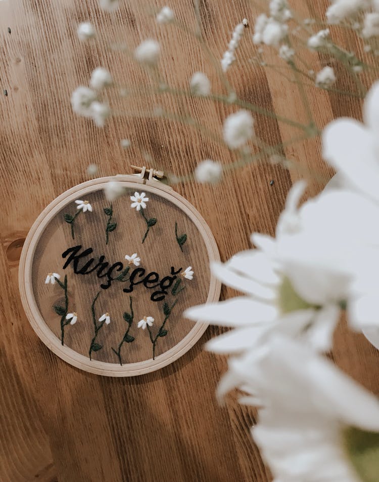 White Flowers On Embroidery Hoop 