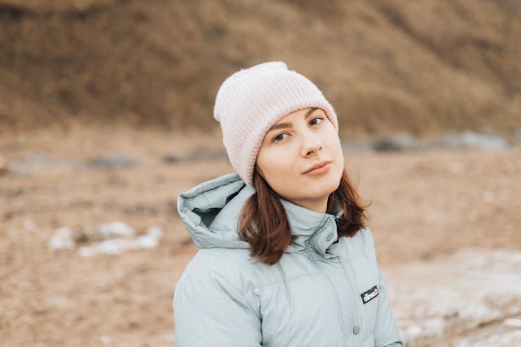 Woman In Sports Jacket Looking At Camera