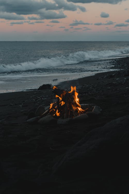 Bonfire Near Crashing Waves on the Beach