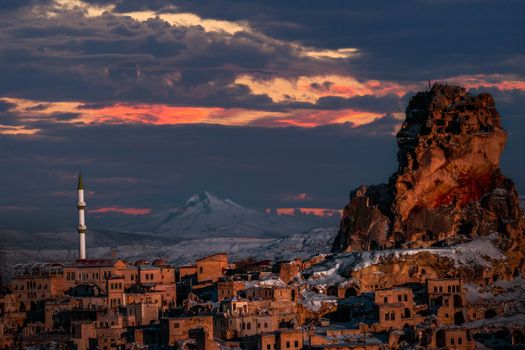 Sunset over Muslim Town in Mountains
