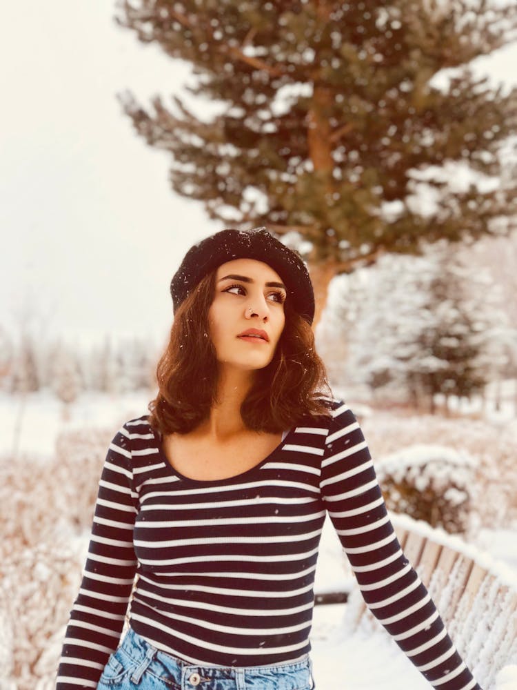 Brunette Woman In Beret Posing Outdoors In Winter