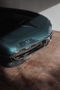Black Car on Brown Floor Tiles