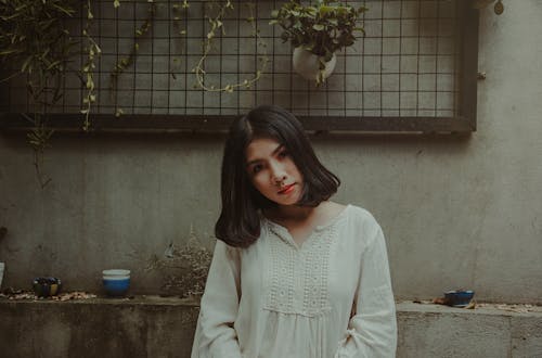 Photography of a Woman Wearing White Top