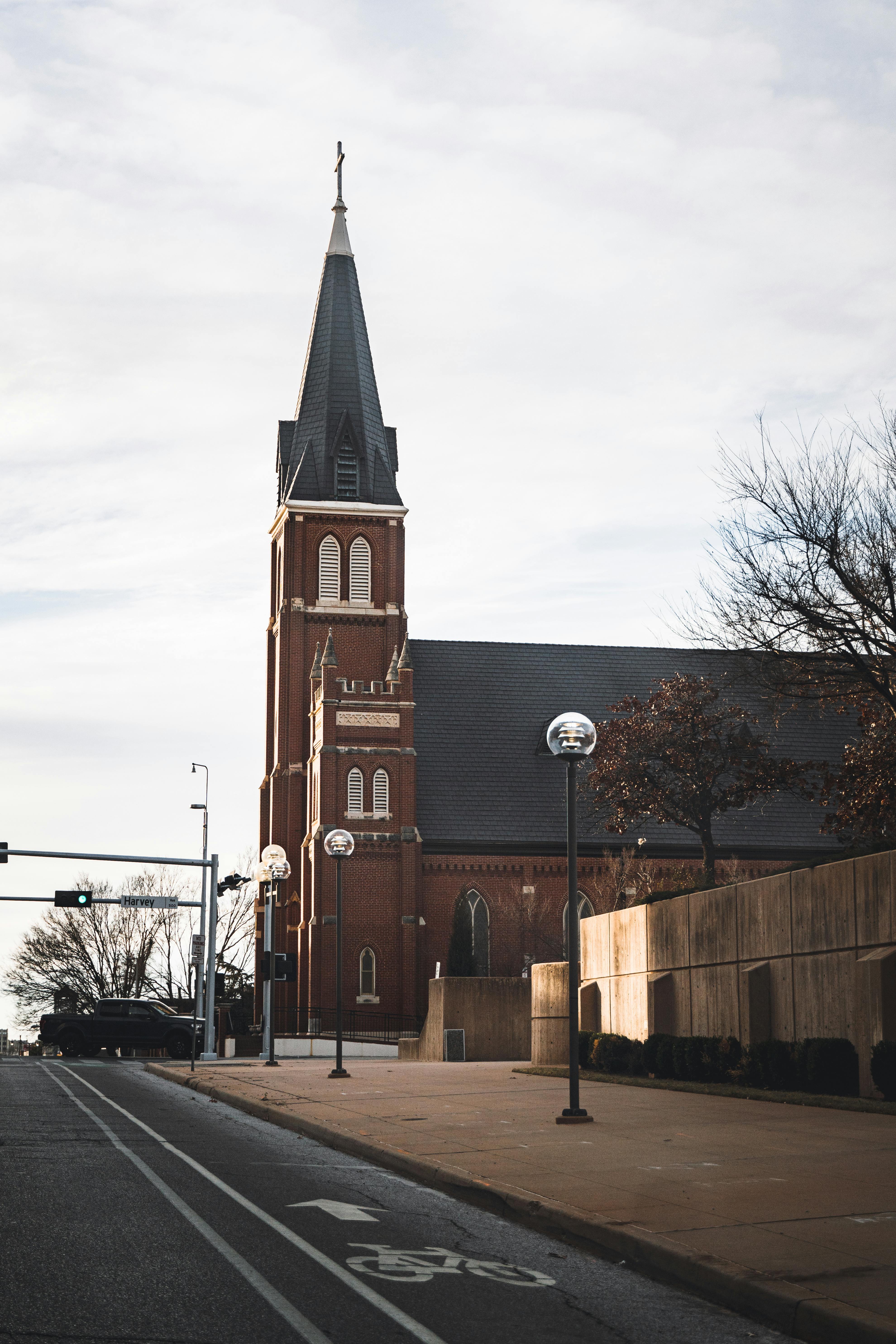 concrete building with a bell tower