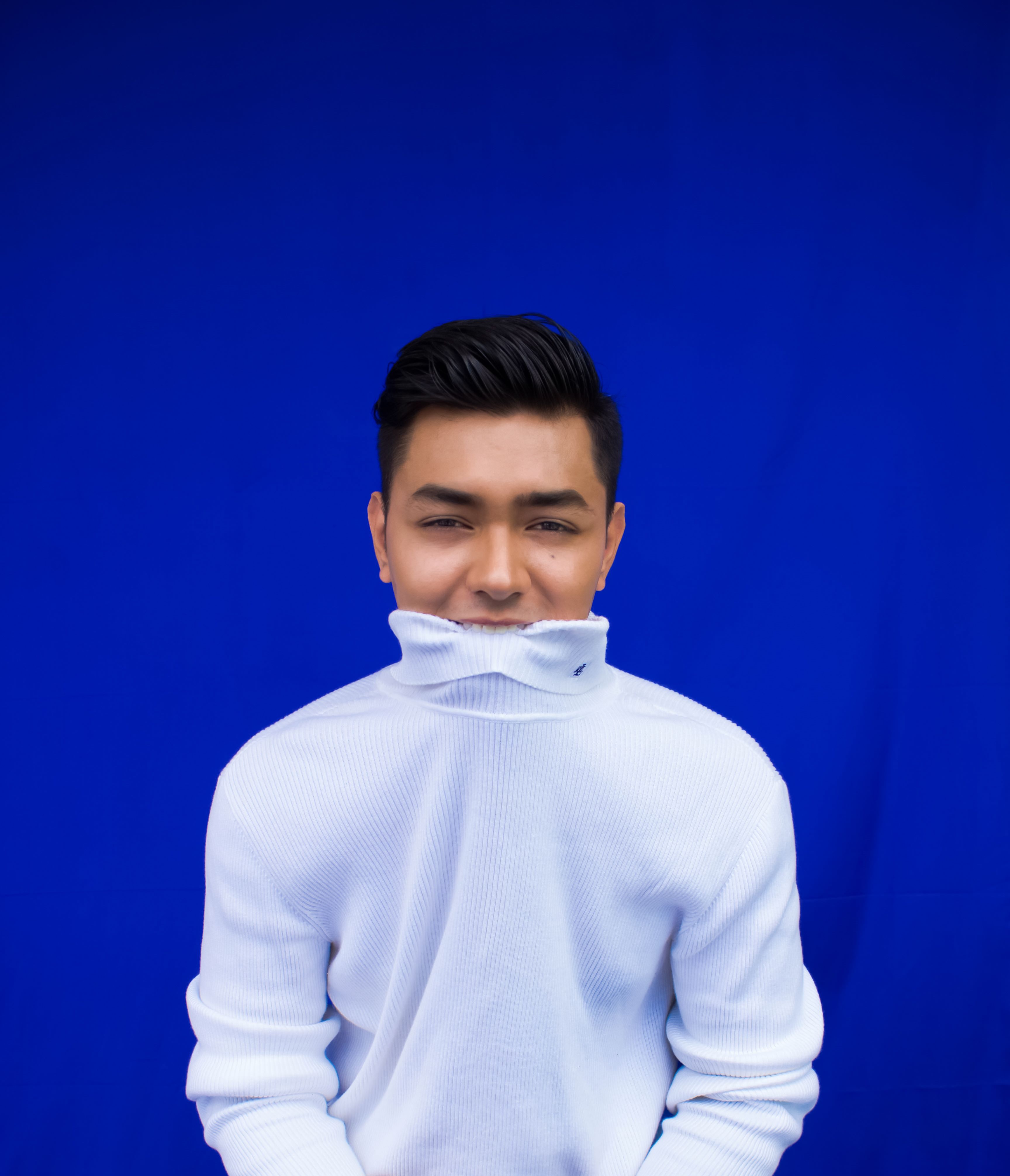 A Man Wearing a Turtleneck Sweater · Free Stock Photo