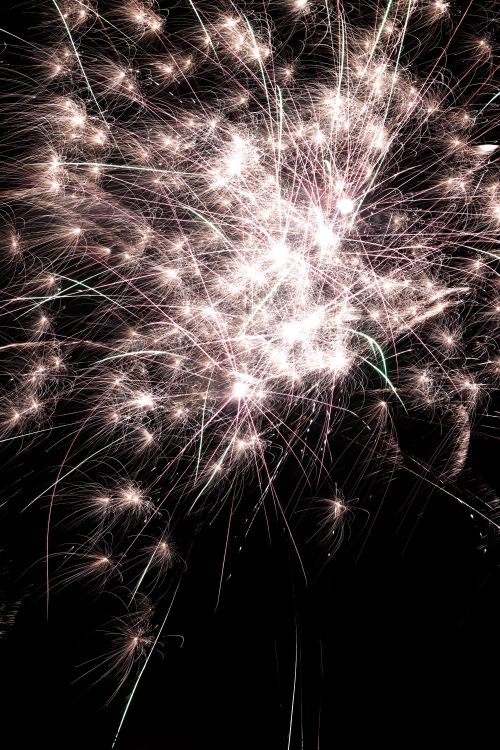 Free A captivating fireworks display lighting up the night sky with vibrant bursts. Stock Photo
