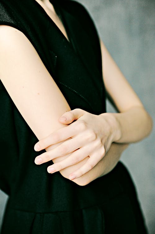 Woman In Black Sleeveless Dress