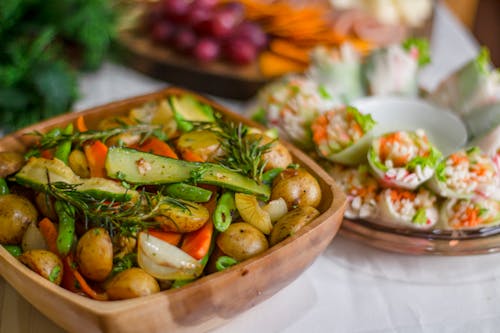 Salad of Potatoes in Wooden Bowl