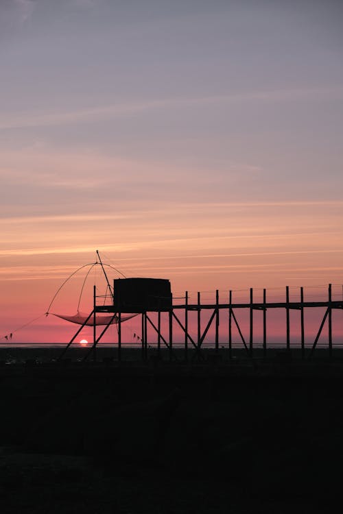 Безкоштовне стокове фото на тему «вертикальні постріл, Захід сонця, морський пейзаж»