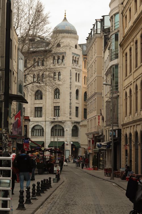 Free A bustling street in Istanbul with historic architecture and lively atmosphere. Stock Photo