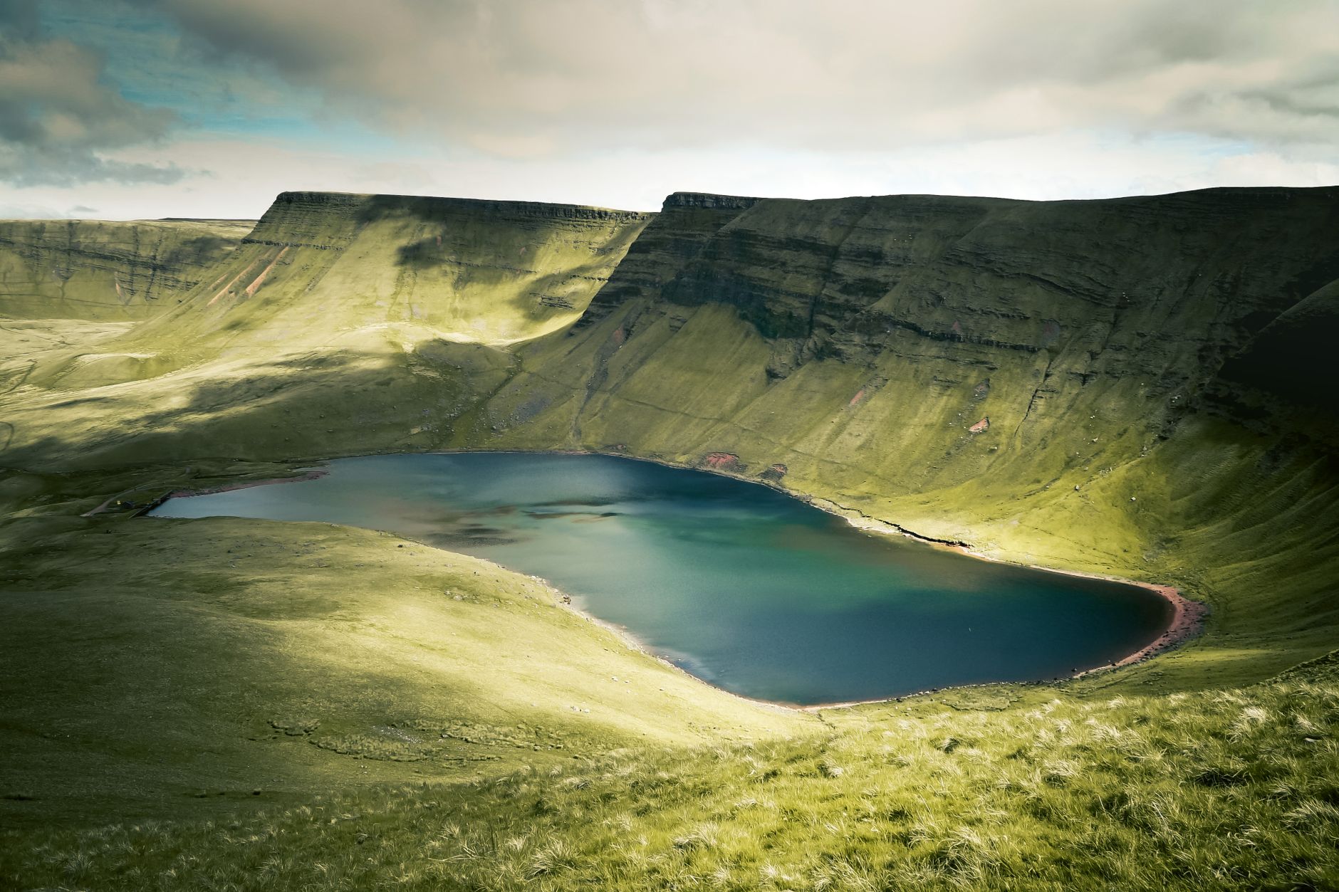 Llyn y Fan Fach lake below the Carmarthen Fans in the western Brecon Beacons