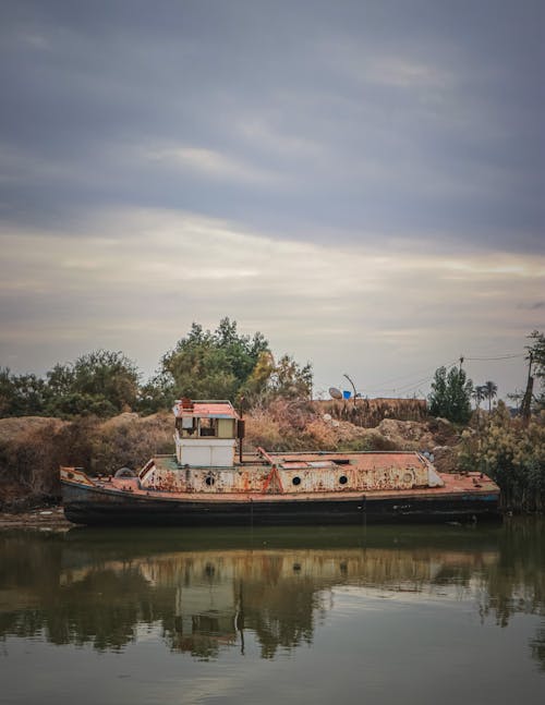 Rusty Shipwreck on the Shore 