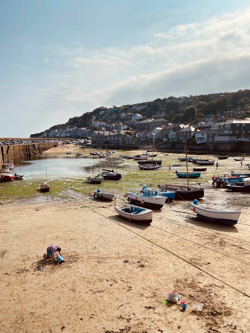 Fishing Boats on a Beach in Mousehole Village, Cornwall, UK