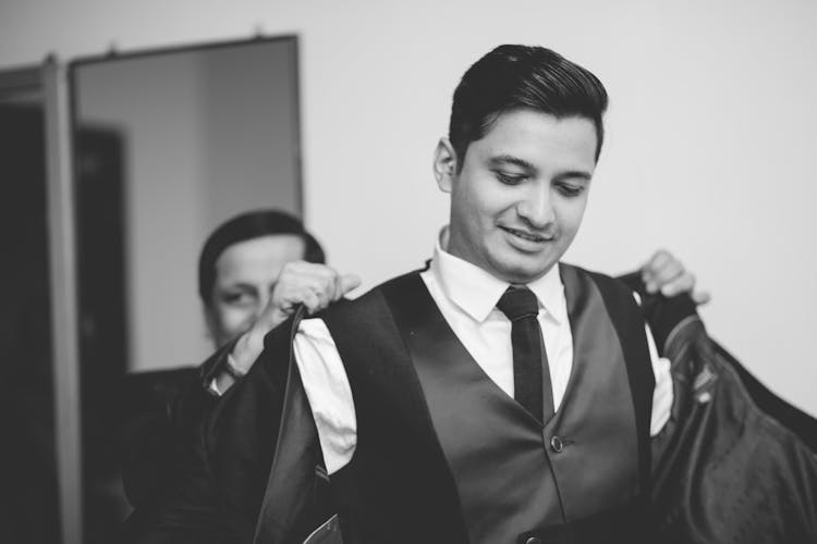 Monochrome Shot Of A Man Wearing A Suit