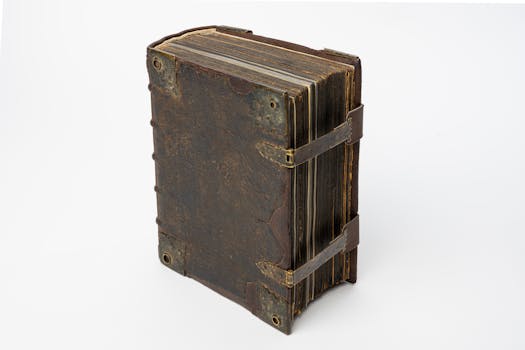 A detailed studio shot of an antique leather-bound manuscript, showcasing its aged and classic appearance.