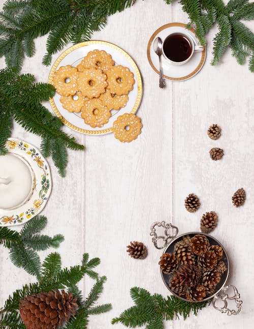 Overhead Shot of Christmas Cookies beside a Cup of Coffee