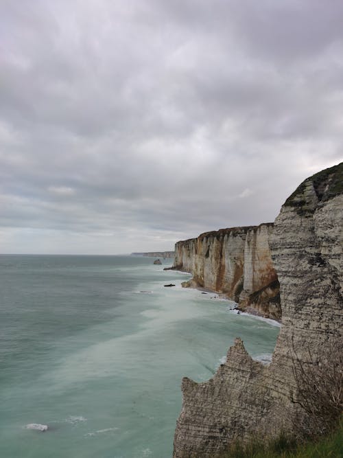 Drone Shot of Sea near Rock Formation