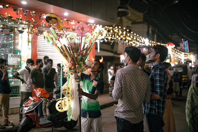 Man Selling Toys On Festi