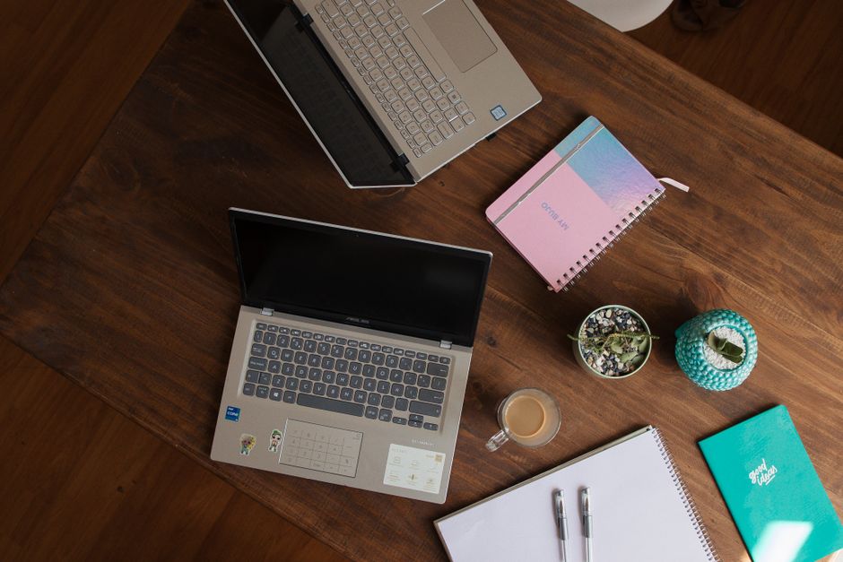 planner beside laptop real home lifestyle photo 2