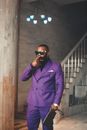 Man in Purple Coat Wearing Black Sunglasses
