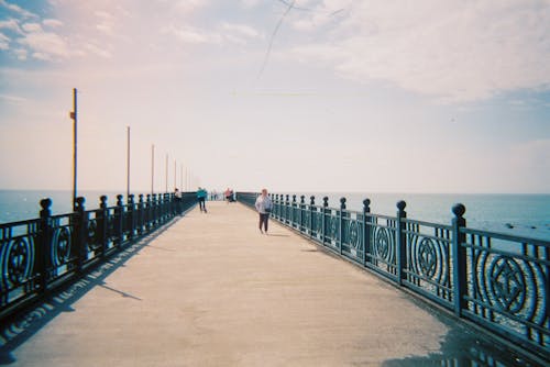 Free People Walking on Bridge Stock Photo