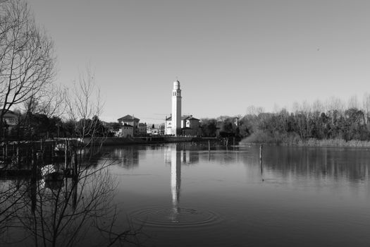 Grayscale Photo of the Casier Harbour as seen from the Sile River