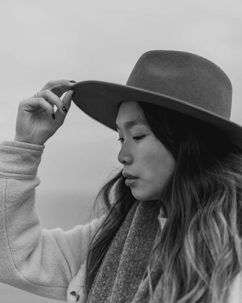 Black and White Portrait of Woman in Wide Brim Hat