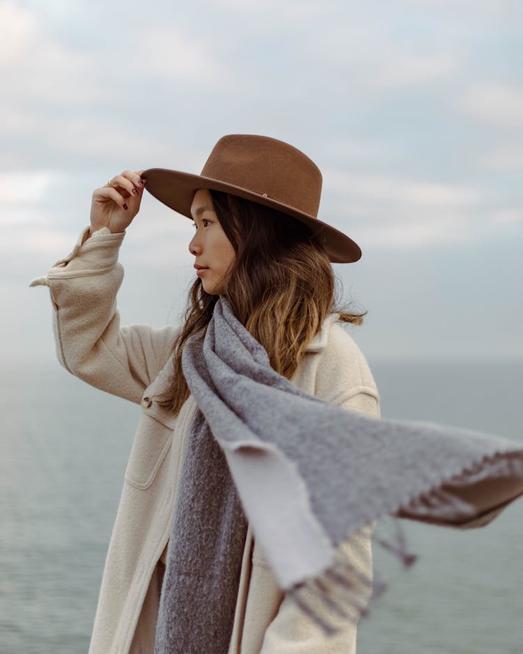 Portrait Of Woman In Wide Brim Hat From Profile