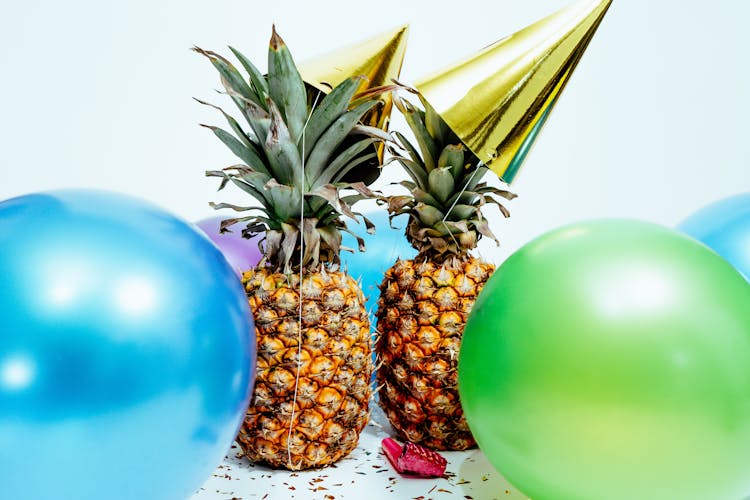 Two Pineapples And Balloons