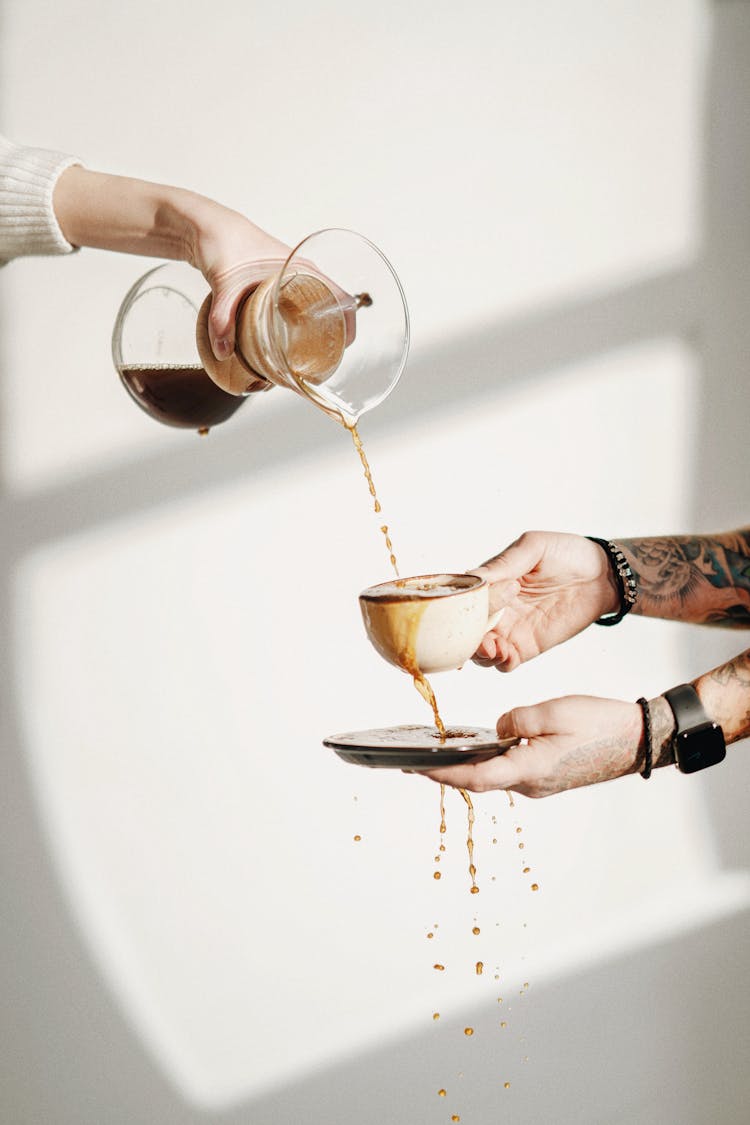 Pouring Coffee In Cup