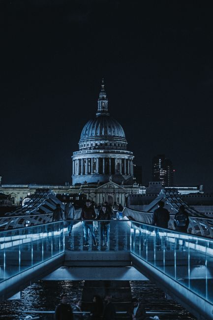 Stunning nighttime view of St Paul's Cathedral from Millennium Bridge in London.