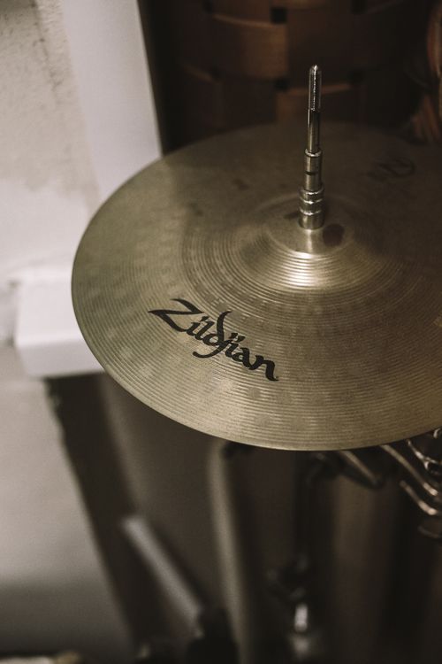Free Vertical shot of a Zildjian cymbal, highlighting intricate design and details, perfect for music enthusiasts. Stock Photo