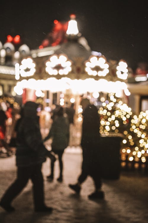 People Walking during Night Time