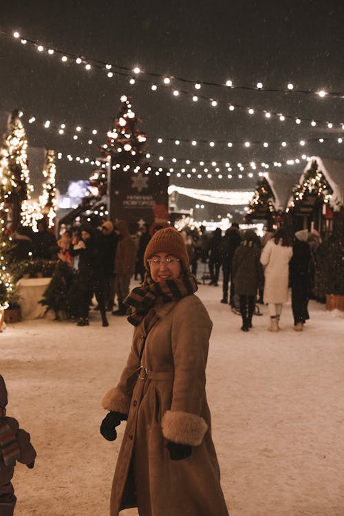 People on Christmas Market in Snow