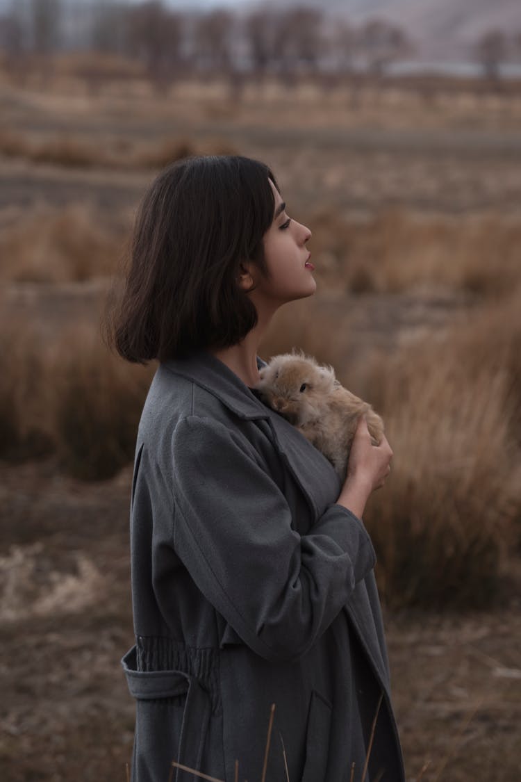 Woman Holding Fluffy Bunny