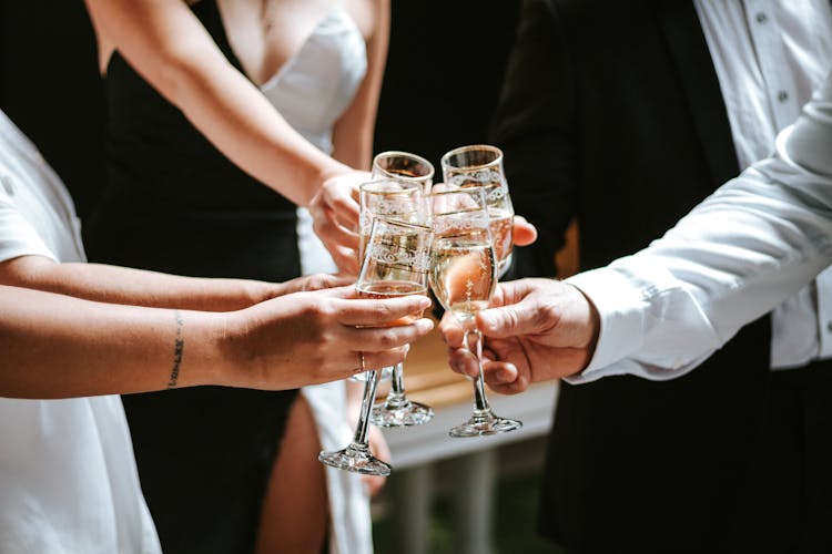 Group Of People Clinking Glasses