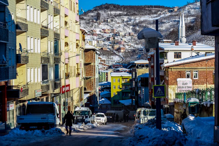 Snowy Street In City In Mountains