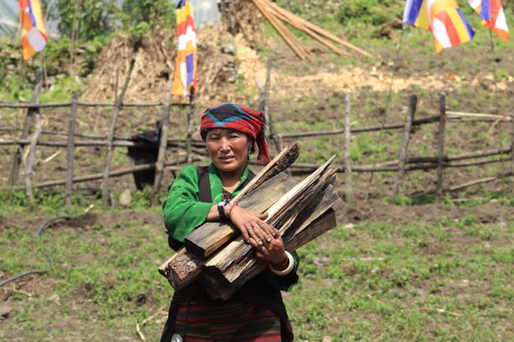 Woman Carrying Firewood 