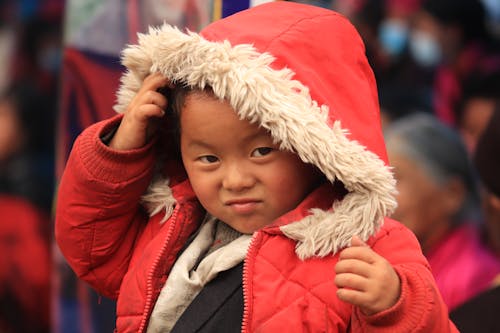 Kid Wearing Red Jacket