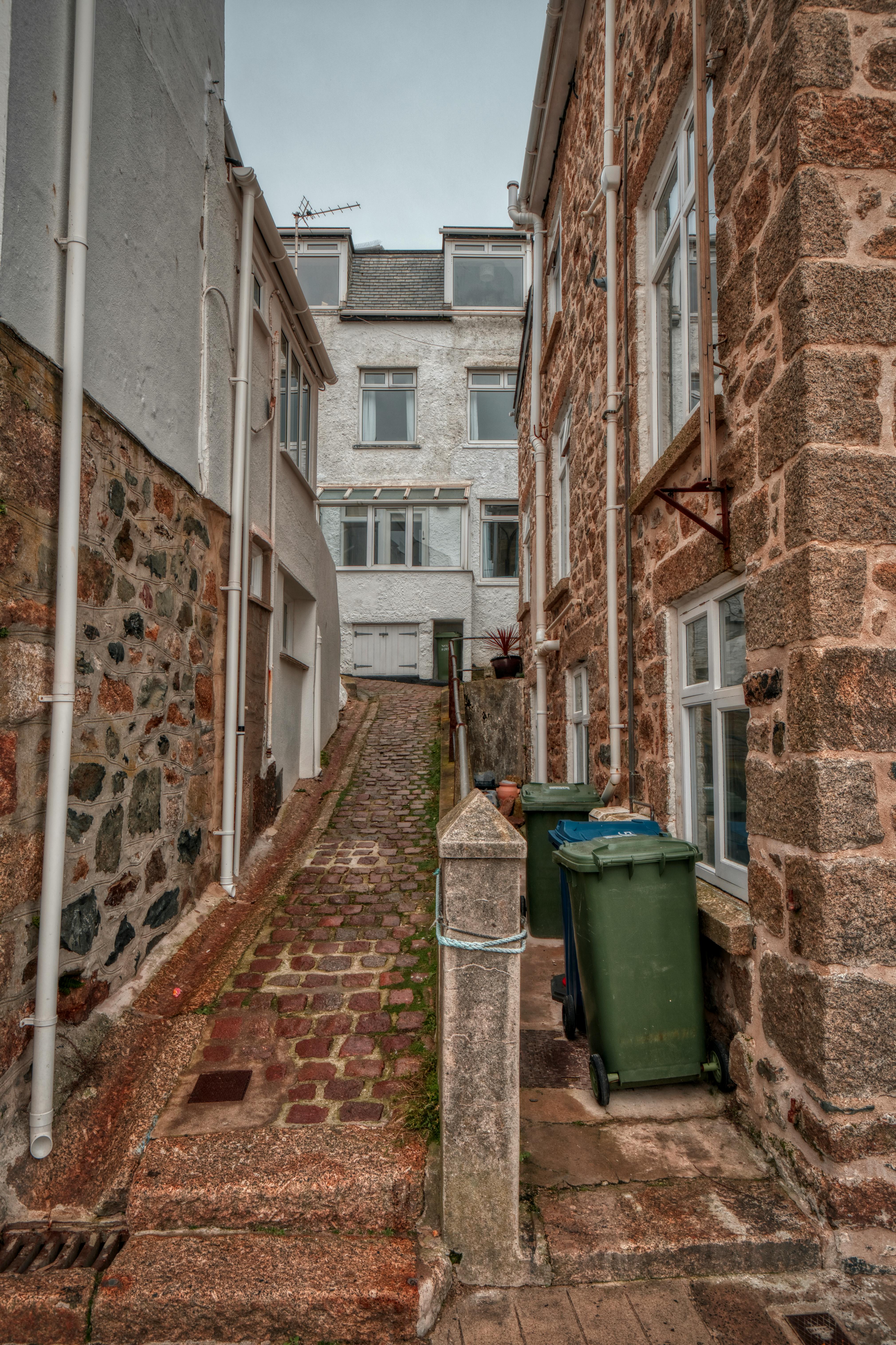 A Brown Alley Going Towards the Building · Free Stock Photo