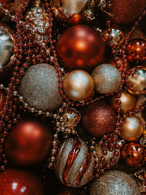 Silver and Gold Baubles on Brown and Silver Beaded Textile