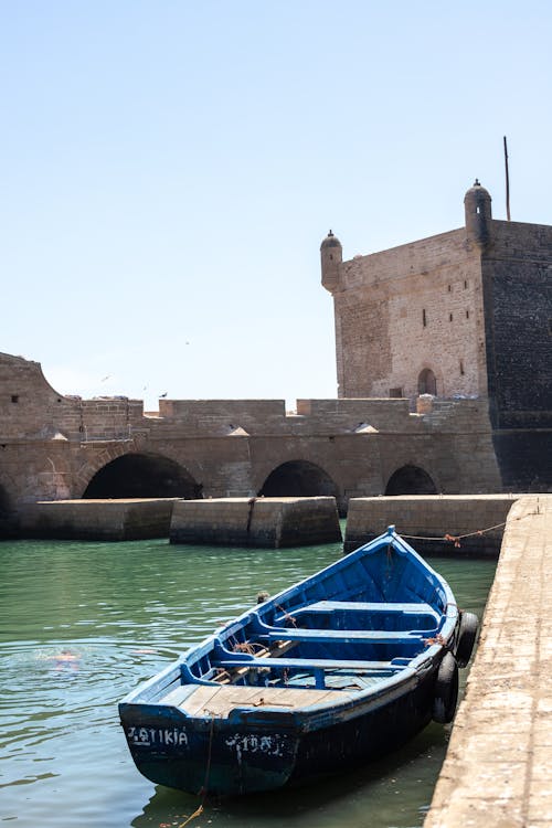 Blue Boat Moored at Pier