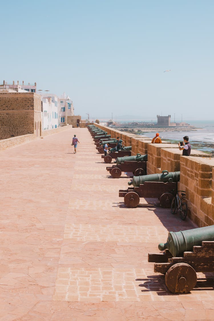 Cannons Along The Pier Wall At Sqala Du Portin Essaouira, Morocco