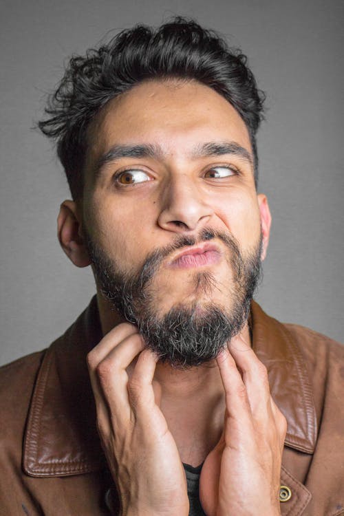 Bearded Man Making a Funny Face 