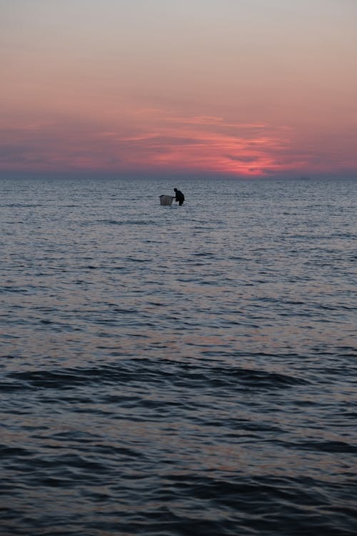 Foto profissional grátis de água, céu do sol, mar