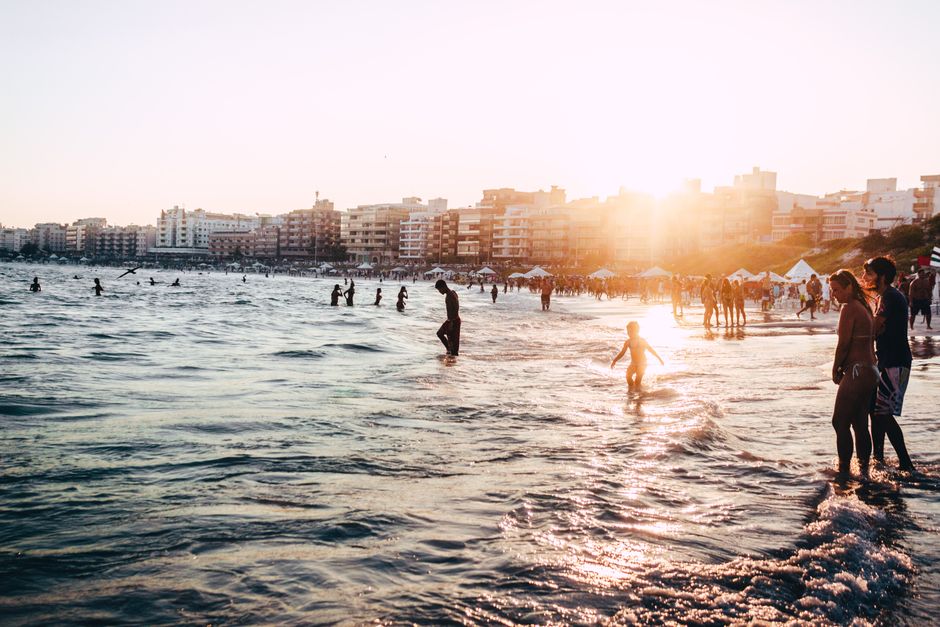 Silhouettes enjoying a sunset beachscape in Vila Nova, Brazil.