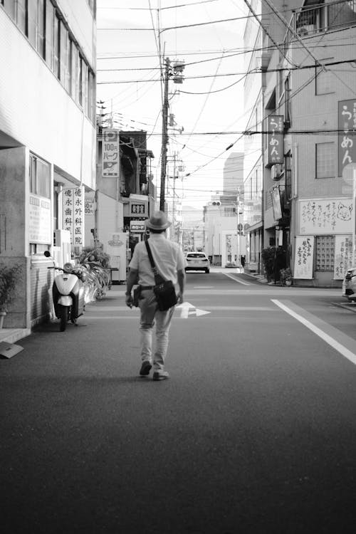 Free Man Walking in City Stock Photo