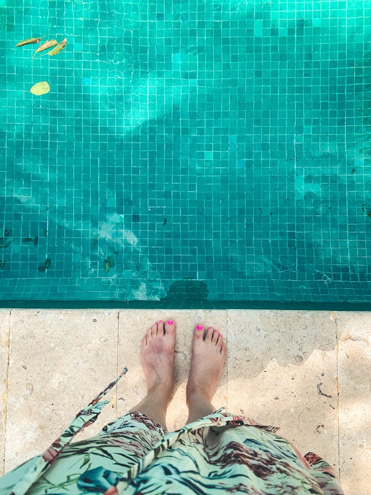 Woman Feet Near Swimming Pool