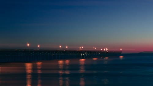 Illuminated Pier at Sunset